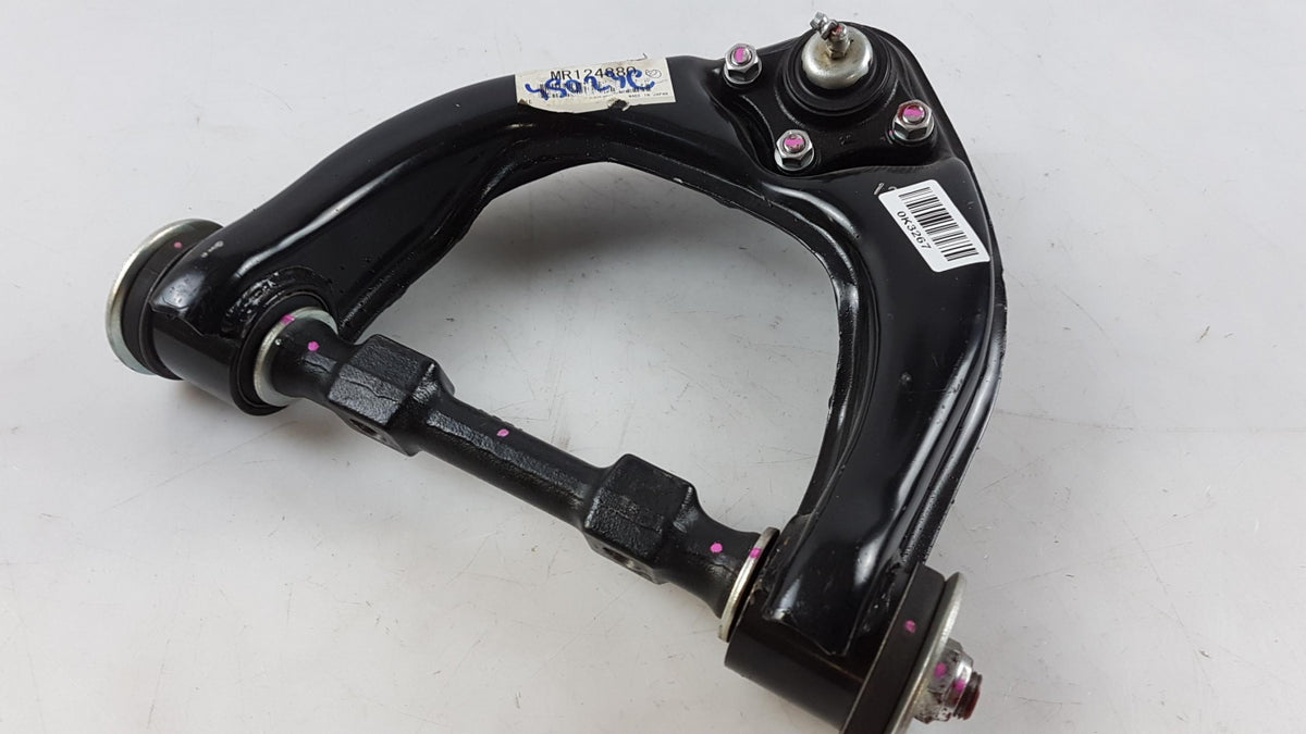 Original OE MITSUBISHI Querlenker MR124880