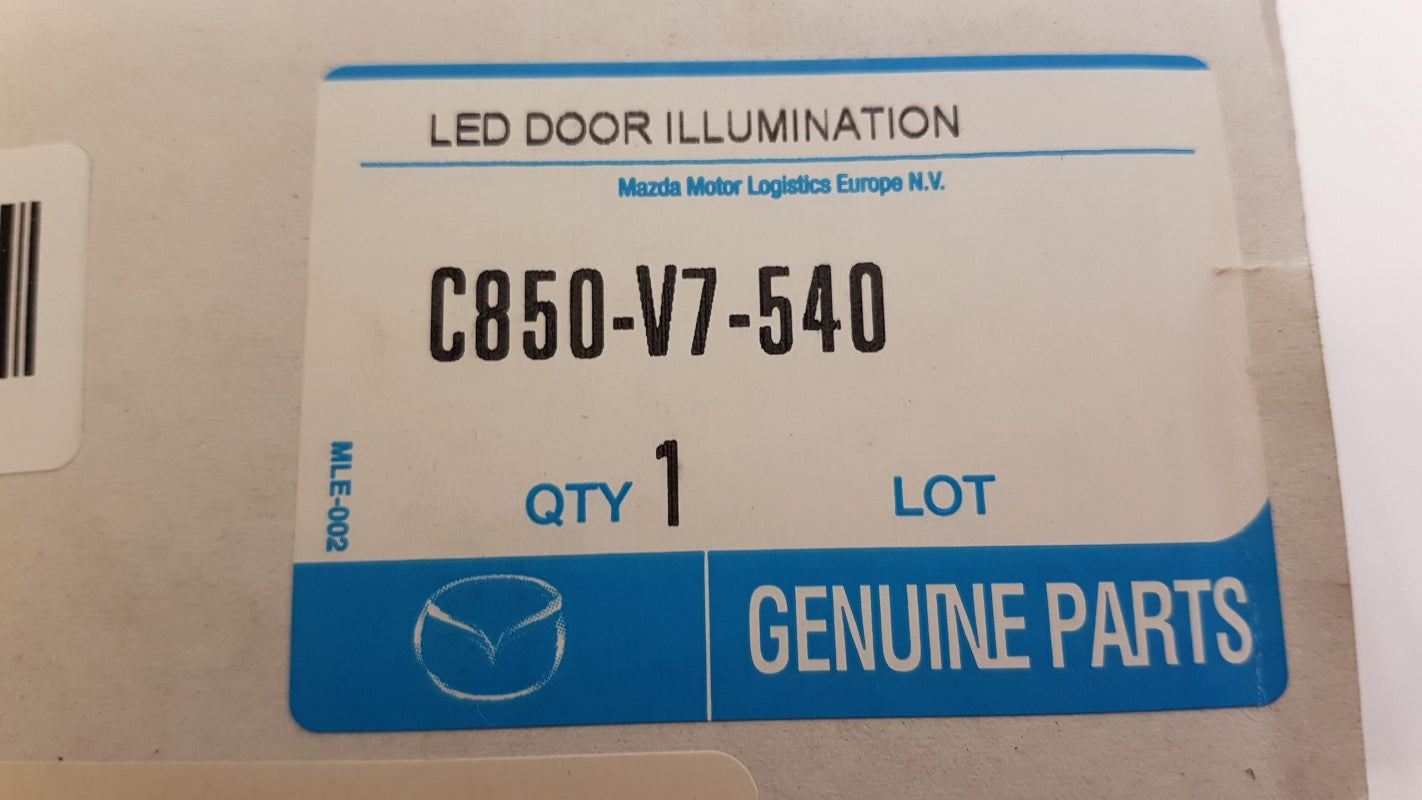 Original MAZDA CX-5 II 2017> Türverkleidungsbeleuchtung mit Mazda-Logo C850V7540