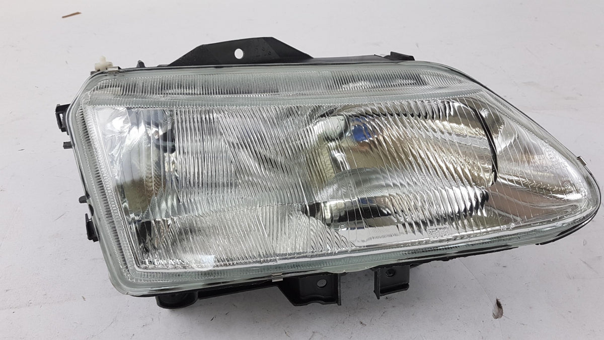 Original OE RENAULT Scheinwerfer 7701038272