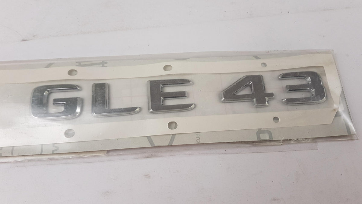 Original OE MERCEDES-BENZ Emblem Plakette A1668176400