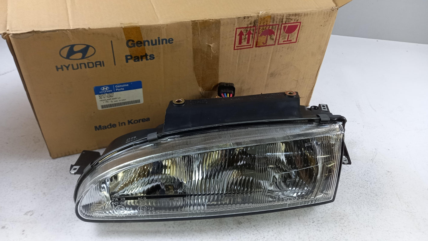 Original HYUNDAI Scoupe (90-95) Frontscheinwerfer Scheinwerfer Links 9210123221