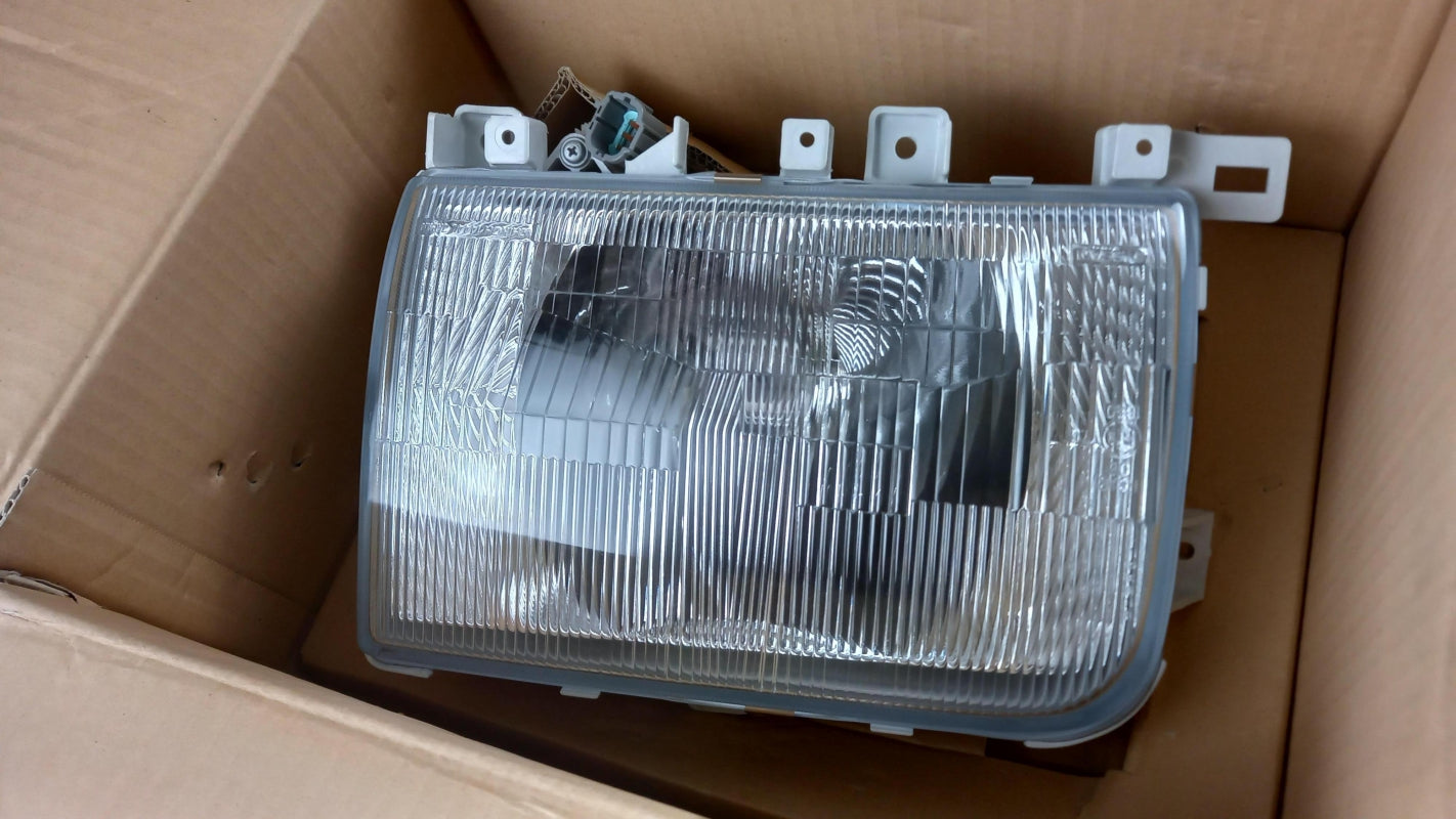 Original NISSAN Cabstar 1994-2000 Scheinwerfer Links 2606032D25