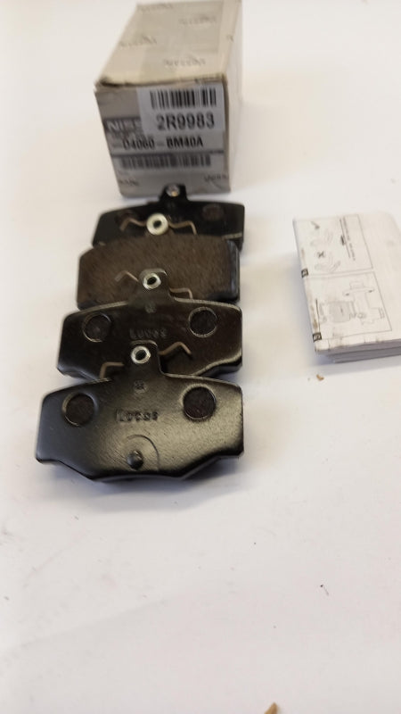 Original NISSAN Almera brake pad set disc brake rear D4060BM40A 