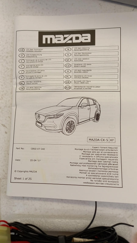 Original MAZDA CX-5 II 2017> Türverkleidungsbeleuchtung mit Mazda-Logo C850V7540