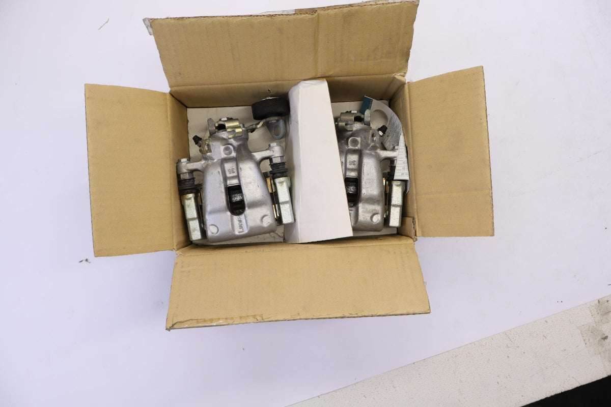 Original OE OPEL Bremssattel Set 93184692