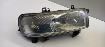 Original OE NISSAN Scheinwerfer 7701044520