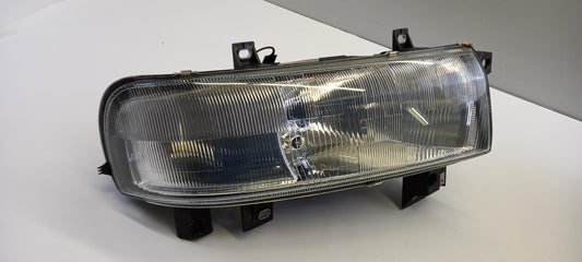 Original OE NISSAN Scheinwerfer 7701044520