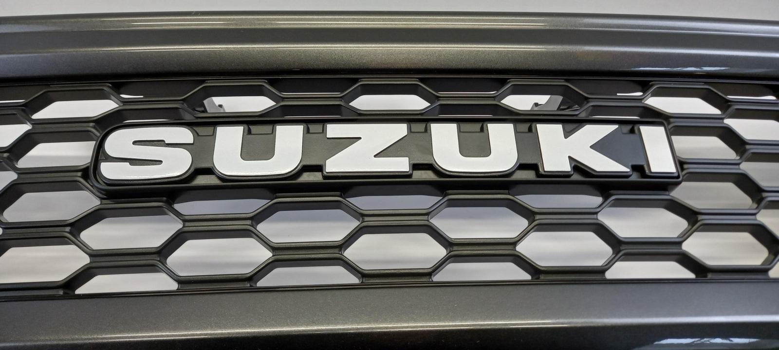 Original OE SUZUKI Kühlergitter 9911C78R00ZSC