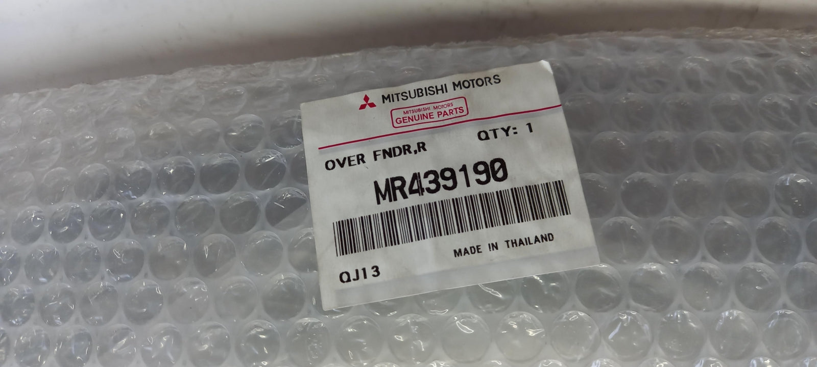 Original OE MITSUBISHI Kotflügel Zierleiste MR439190