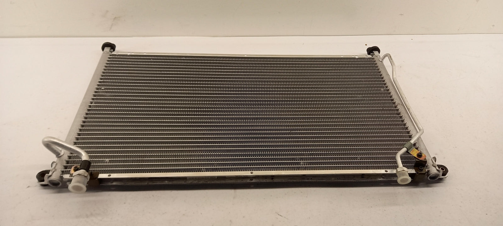 Original OE NISSAN Klimakondensator 921107F700