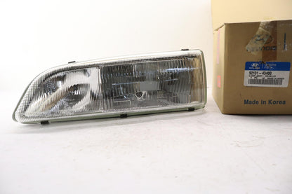 Original OE HYUNDAI/KIA Scheinwerfer 9213143400