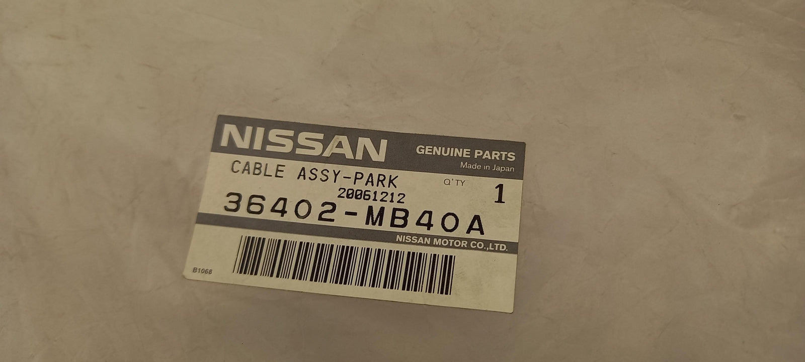 Original OE NISSAN Feststellbremse Seilzug 36402MB40A