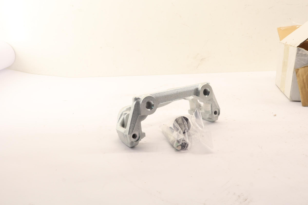 Original OE MERCEDES-BENZ Bremssattel Träger A9074233300