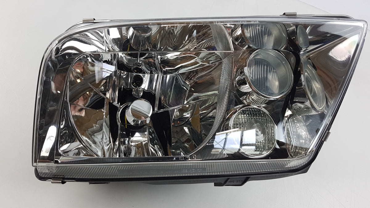 Original VW Bora '99-'02 Halogen Hauptscheinwerfer links 1J5941017AD